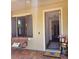 Front entryway with view into the home and a hanging porch swing at 4035 Solamor St, Lakeland, FL 33810