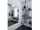 Home gym with a large mirror and various exercise equipment at 4035 Solamor St, Lakeland, FL 33810