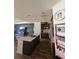 Modern kitchen with island, stainless steel appliances, and dark cabinets at 4035 Solamor St, Lakeland, FL 33810