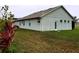 House backyard with grassy area at 2912 Sweetspire Cir, Kissimmee, FL 34746