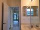 Bathroom with single sink and access to other rooms at 2912 Sweetspire Cir, Kissimmee, FL 34746