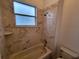 Clean bathroom with bathtub and shower at 2912 Sweetspire Cir, Kissimmee, FL 34746