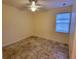 Spacious bedroom with tile flooring and ceiling fan at 2912 Sweetspire Cir, Kissimmee, FL 34746