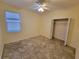 Bright bedroom with tile floors and a large closet at 2912 Sweetspire Cir, Kissimmee, FL 34746