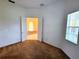 Bedroom with carpet and door to another room at 2912 Sweetspire Cir, Kissimmee, FL 34746