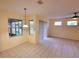 Bright breakfast nook with tile floors and view of backyard at 2912 Sweetspire Cir, Kissimmee, FL 34746