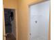 View into garage from laundry and additional storage area at 2912 Sweetspire Cir, Kissimmee, FL 34746