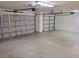 Two-car garage with extra storage and electric car charger at 2912 Sweetspire Cir, Kissimmee, FL 34746