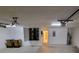 Garage with storage space, HVAC unit, and electric car charger at 2912 Sweetspire Cir, Kissimmee, FL 34746