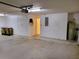 Garage with extra storage space and access to other areas at 2912 Sweetspire Cir, Kissimmee, FL 34746
