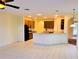 Open kitchen boasts a breakfast bar, ample cabinetry, and tile flooring at 2912 Sweetspire Cir, Kissimmee, FL 34746