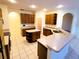 Spacious kitchen featuring an island and ample cabinetry at 2912 Sweetspire Cir, Kissimmee, FL 34746