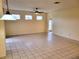 Large living room with tile floors and lots of natural light at 2912 Sweetspire Cir, Kissimmee, FL 34746
