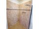 Clean and modern shower with neutral-toned tile at 2912 Sweetspire Cir, Kissimmee, FL 34746
