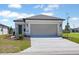 Charming single-story home with a two-car garage and well-maintained landscaping at 5915 Sw 87Th Ave, Ocala, FL 34481