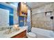 Clean bathroom with tub, shower, and vanity at 613 4Th Ne St, Fort Meade, FL 33841