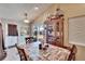 Bright dining area with table, chairs, and view to backyard at 613 4Th Ne St, Fort Meade, FL 33841