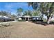 Single story home with a spacious front yard at 613 4Th Ne St, Fort Meade, FL 33841