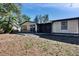 Rear view of house, showing patio and yard at 613 4Th Ne St, Fort Meade, FL 33841