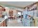 Open kitchen with granite countertops and stainless steel appliances at 613 4Th Ne St, Fort Meade, FL 33841