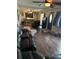Inviting living room showcasing hardwood floors and neutral color palette at 613 4Th Ne St, Fort Meade, FL 33841