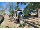 Wooden playset in large backyard at 613 4Th Ne St, Fort Meade, FL 33841