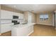 Bright kitchen with stainless steel appliances, a center island, and an open floor plan at 5329 Sw 81St Cir, Ocala, FL 34481