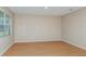 Versatile room with neutral walls, modern flooring, and a window providing natural light at 5329 Sw 81St Cir, Ocala, FL 34481