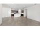 Open floor plan showing the bright kitchen with central island and modern appliances at 8223 Sw 52Nd Lane Rd, Ocala, FL 34481