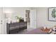 Bedroom with dresser and access to a second bathroom at 1848 Bright Sky Dr, Kissimmee, FL 34744