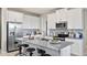 Modern kitchen featuring stainless steel appliances and an island at 1848 Bright Sky Dr, Kissimmee, FL 34744