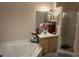 Bathroom with shower, bathtub, and vanity at 2948 W Cottage Grove Ct # Ge, Orlando, FL 32822