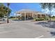 Community clubhouse with covered entry and parking at 2948 W Cottage Grove Ct # Ge, Orlando, FL 32822