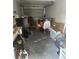Attached garage with ample storage space at 2948 W Cottage Grove Ct # Ge, Orlando, FL 32822