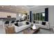 Open-concept living room featuring stylish decor and plenty of natural light at 5222 Sw 88Th Cir, Ocala, FL 34481