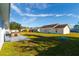 Backyard view with hot tub and grill at 3088 Sire Trl, Lakeland, FL 33811