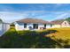 Spacious backyard with hot tub, grill, and patio at 3088 Sire Trl, Lakeland, FL 33811