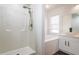 Updated bathroom featuring a walk-in shower and bathtub at 3088 Sire Trl, Lakeland, FL 33811