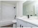 Modern bathroom with white cabinets and marble shower at 3088 Sire Trl, Lakeland, FL 33811