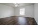 Bright bedroom with laminate wood floor and ceiling fan at 3088 Sire Trl, Lakeland, FL 33811