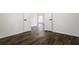 Spacious bedroom with dark brown wood-look flooring at 3088 Sire Trl, Lakeland, FL 33811