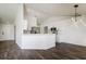 Modern kitchen with white cabinets, stainless steel appliances and a large island at 3088 Sire Trl, Lakeland, FL 33811