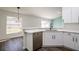 Bright kitchen with white cabinets, quartz countertops, and a stylish sink at 3088 Sire Trl, Lakeland, FL 33811
