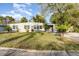 Ranch style home with a large yard and mature trees at 5883 Dogwood Dr, Orlando, FL 32807