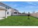 Large grassy backyard with a privacy fence at 1076 Sugarwood St, Davenport, FL 33837