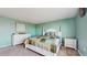 Charming bedroom with a queen bed and plenty of closet space at 1076 Sugarwood St, Davenport, FL 33837