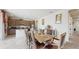 Elegant dining room with a large table and leather chairs at 1076 Sugarwood St, Davenport, FL 33837