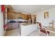Modern kitchen with stainless steel appliances and granite countertops at 1076 Sugarwood St, Davenport, FL 33837