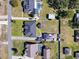 Bird's-eye view of the house and surrounding area, including a pool at 164 Sunrise Hill Ln, Auburndale, FL 33823