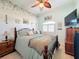 Charming bedroom with a queen bed and tranquil decor at 164 Sunrise Hill Ln, Auburndale, FL 33823
